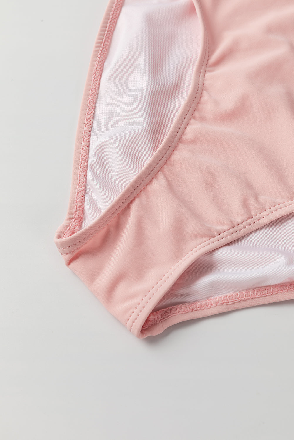 Maillot de bain tankini rose à rayures et ourlet noué en maille