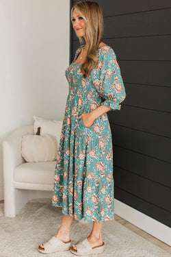 Smocked long dress with floral print and large green square collar