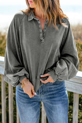 Faded gray sweatshirt with snap buttons and lantern sleeves