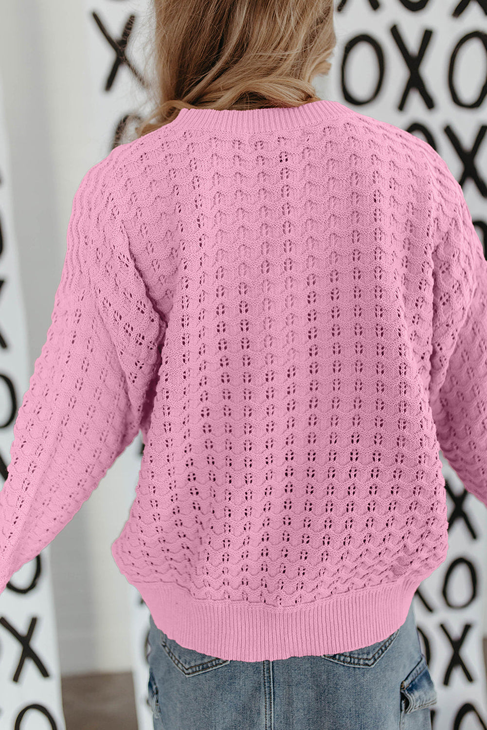 Pink shoulder sweater falling in crochet knitting