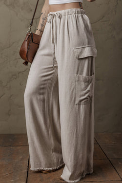 Pantalon ample cargo beige en lin avec cordon de serrage à la taille et bords bruts