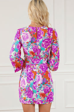 Purple floral dress with keyhole back and long sleeves with belt