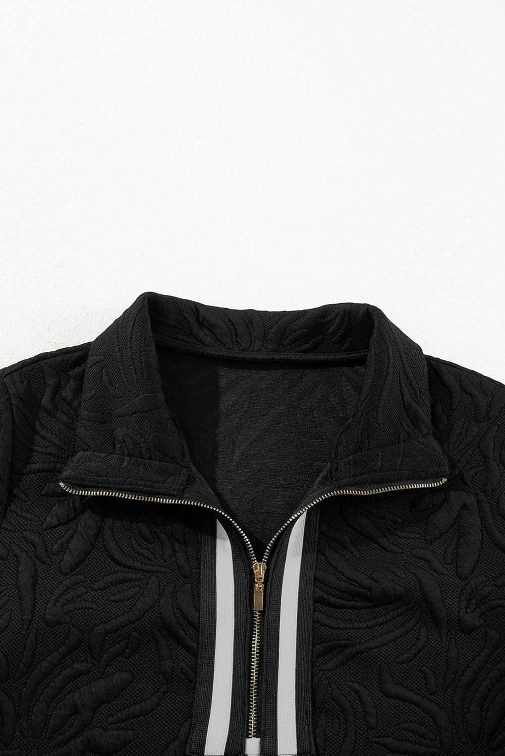Black right-down mini-darling in jacquard with zipper on a quarter
