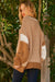 Pull surdimensionné beige français clair avec points contrastés