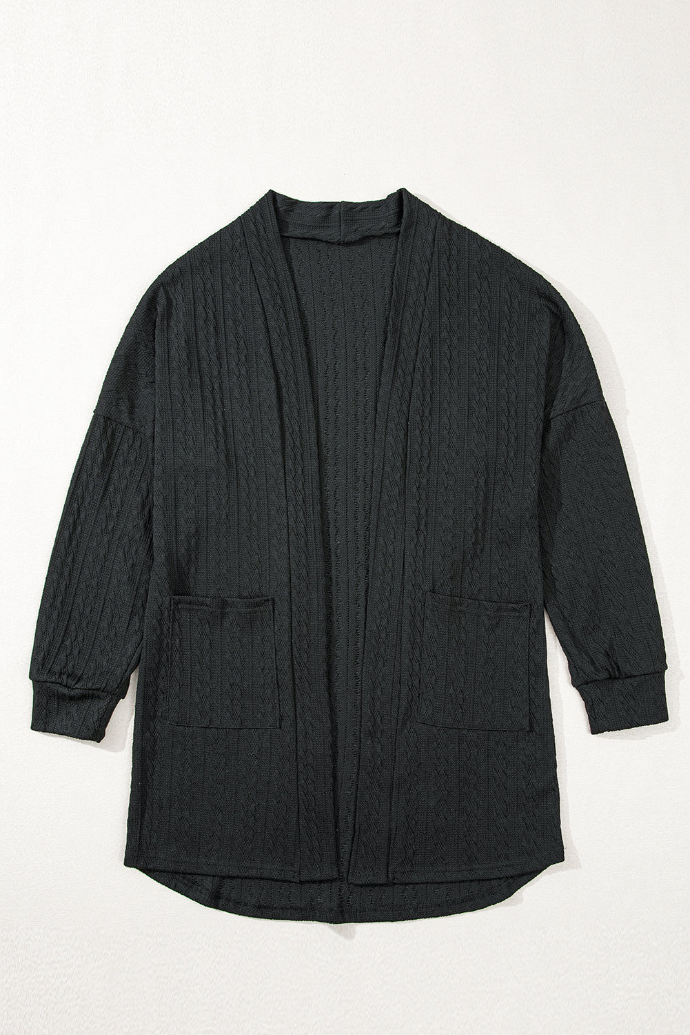 Cardigan noir ouvert sur le devant avec poches latérales en tricot texturé