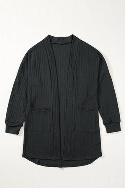 Cardigan noir ouvert sur le devant avec poches latérales en tricot texturé