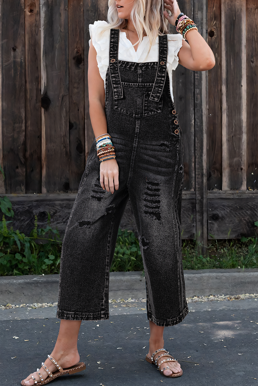 Salopette en jean noir effet vieilli avec poche à bavette et jambe large