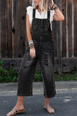Salopette en jean noir effet vieilli avec poche à bavette et jambe large