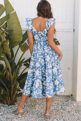 Robe mi-longue fluide à volants et épaules flottantes à fleurs bleu ciel