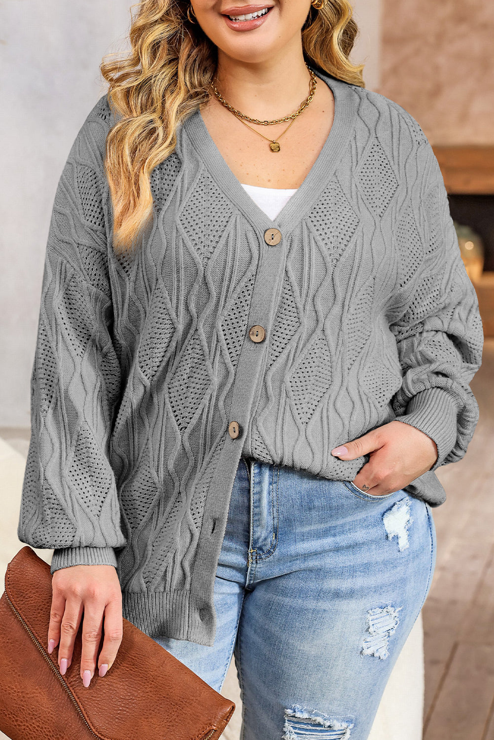 Gris plus taille tricotée en tricot de cardigan up up