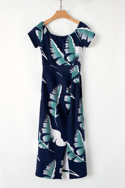 Robe mi-longue moulante bleue à épaules dénudées et fente à motif imprimé