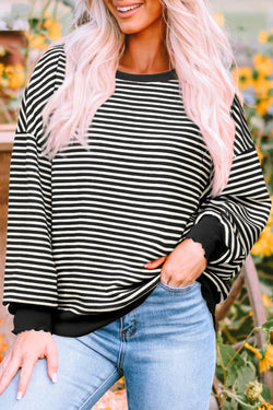 Long sleeve top and drooping shoulders with black stripes