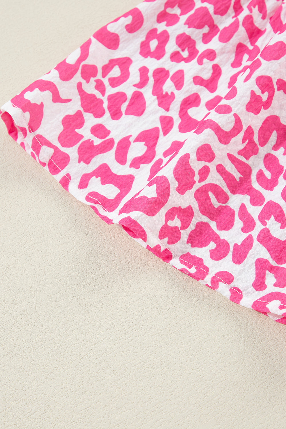 Mini-robe rose vif imprimée léopard *