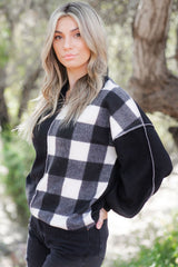 Black checkerboard patchwork collared top with exposed seams