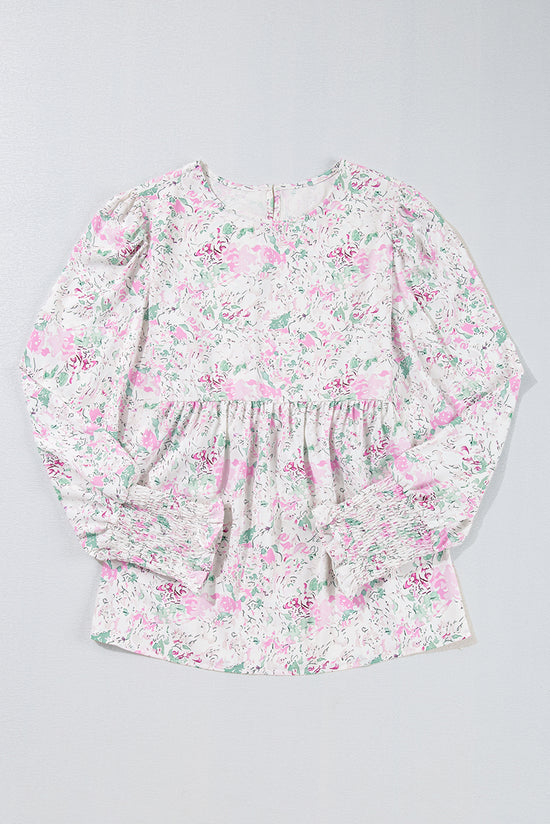 Babydoll pink blouse with floral print and frozen balloon sleeves with lock hole on the back