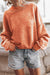 Orange sweatshirt with neck and drooping shoulders