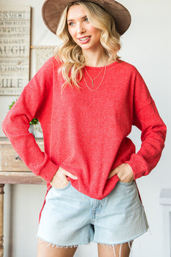 High swelling sweater with side slit