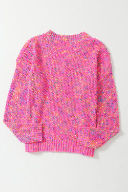 Decreeed sweater knitted with colored polka dots *