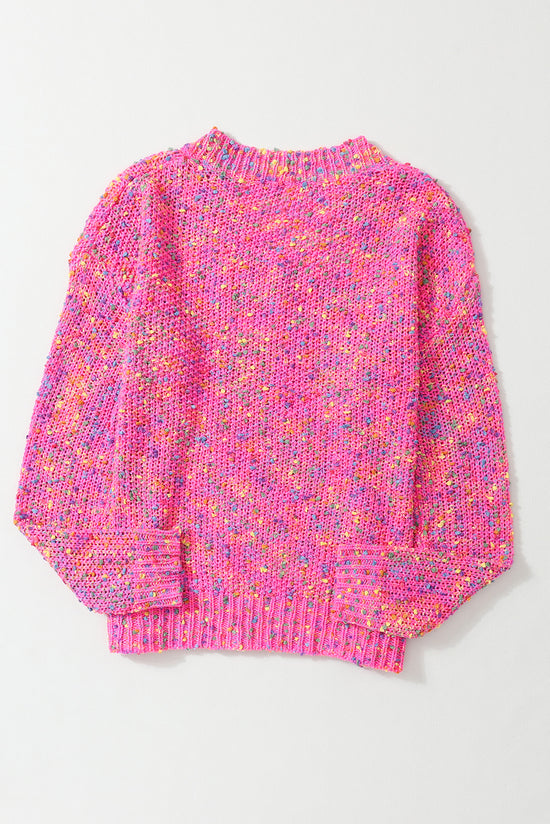 Decreeed sweater knitted with colored polka dots *