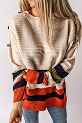 White striped sweater with dropped shoulders and buttoned shoulders