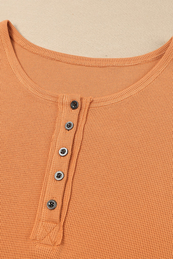 Haut Henley en tricot gaufré orange