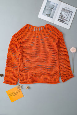 Orange tunic with handle knitting sleeves open to crochet