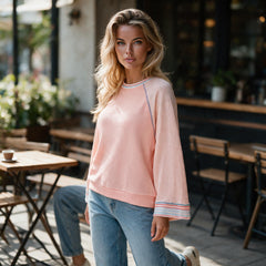 Haut abricot en maille gaufrée à manches raglan