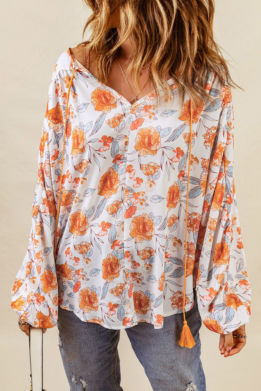 Blouse Dolman orange fendue à col en V et imprimé floral