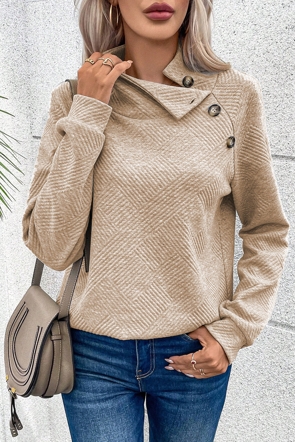 Apricot textured mock neck sweatshirt with asymmetrical buttons