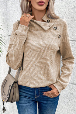 Apricot textured mock neck sweatshirt with asymmetrical buttons