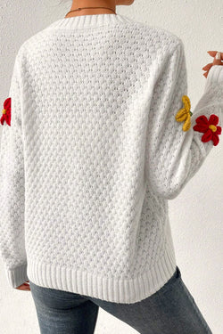 Pull en tricot texturé avec appliques de fleurs colorées blanches