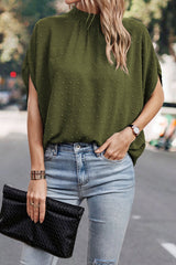 Blouse vert brume à pois suisses, col montant, manches chauve-souris-A WOMAN WE LOVE