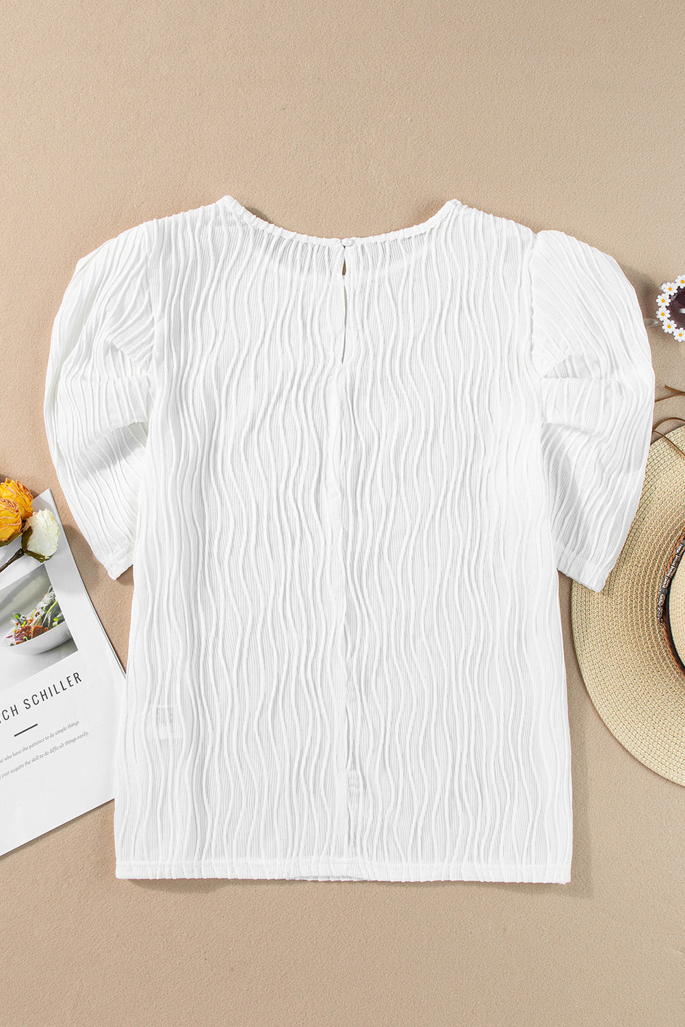 Textured white t-shirt with puffy short sleeves