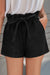 Short en tricot de coton mélangé noir à poches