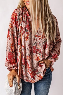 Pink printed blouse split in v -collar