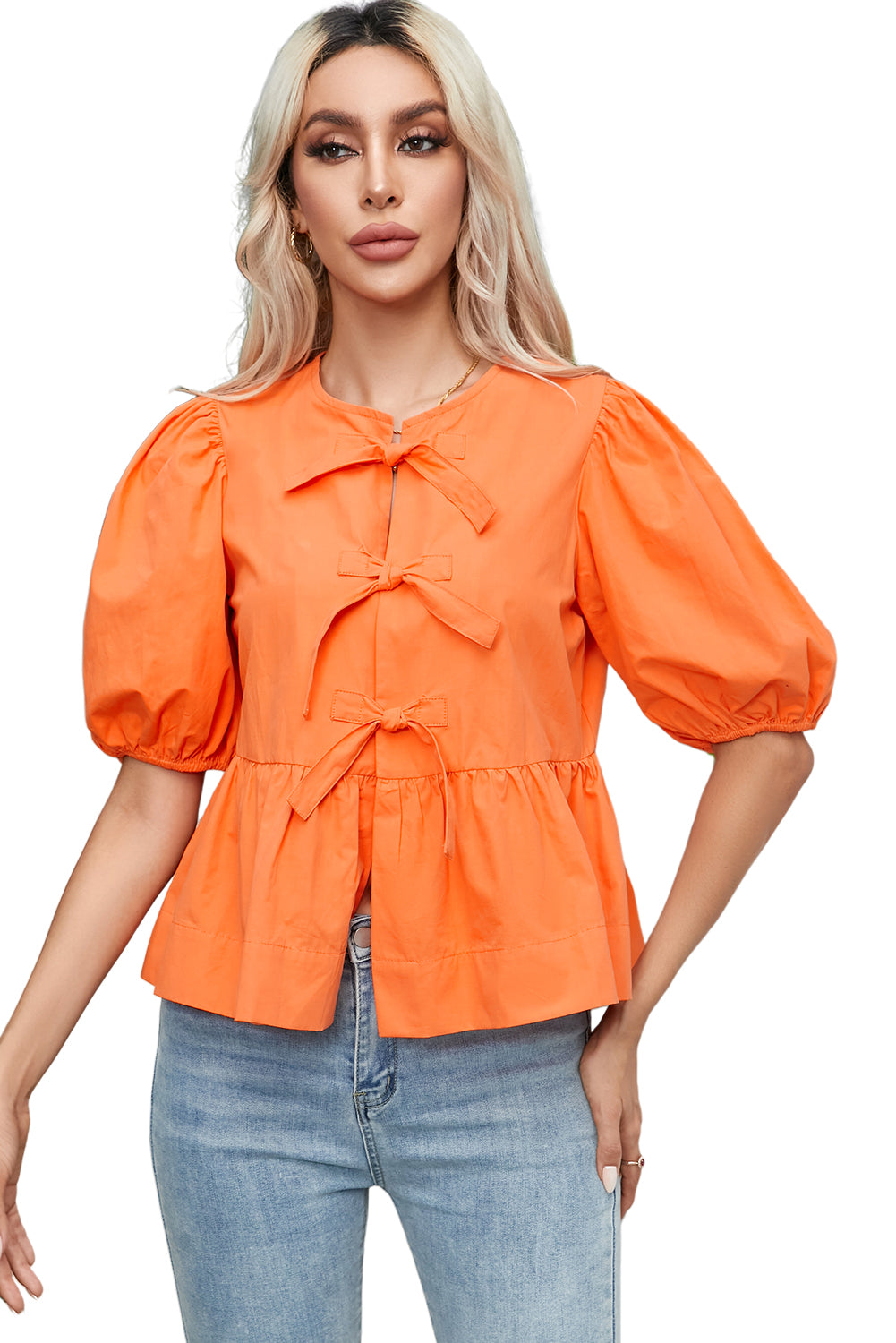 Blouse à peplum à manches courtes nouées orange nouée à l'orange nouée