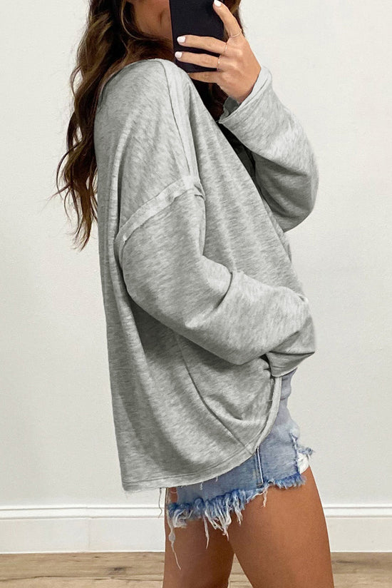 Grey oversized top with pockets and dropped sleeves