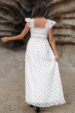 Robe longue smockée blanche à pois *