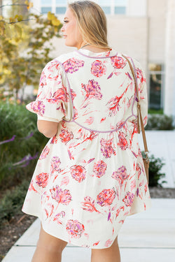 Mini dress with floral print with lace -ups and V -neck with large white balloon sleeves