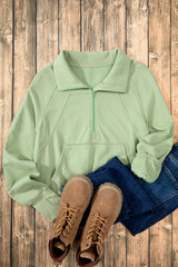 Smoke green sweatshirt with kangaroo pocket and stand-up collar with quarter zip