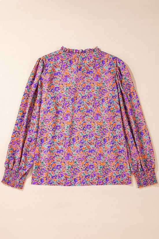 Blusa violeta con estampado floral *