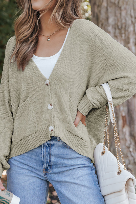 Grey sweater cardigan with front pockets and buttons