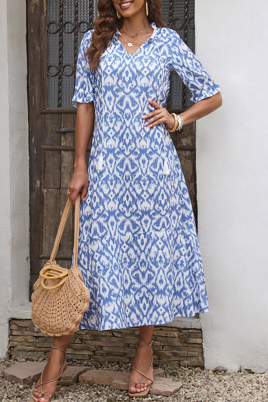 Long relaxed dress with geometric sky blue print with v -neck collar