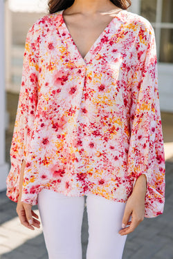 Blusa rosa con pequeñas flores *