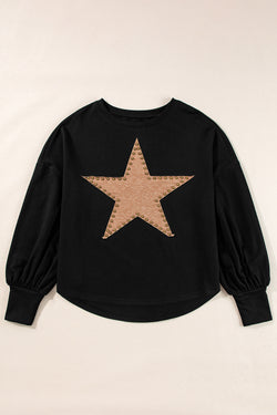 Black oversized high with long sleeves and studded star pattern