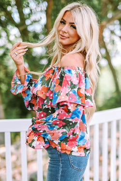 Flying blouse and bare shoulders with floral print