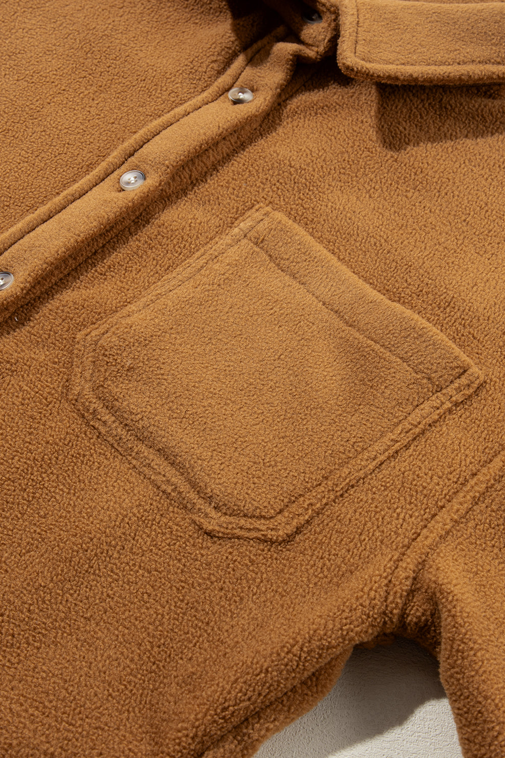 Buttoned fleece jacket with camel breast pocket