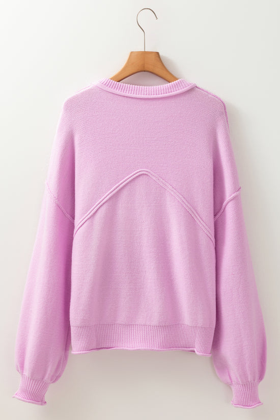 Pink shoulder pink sweater and ribbed details with raw edges