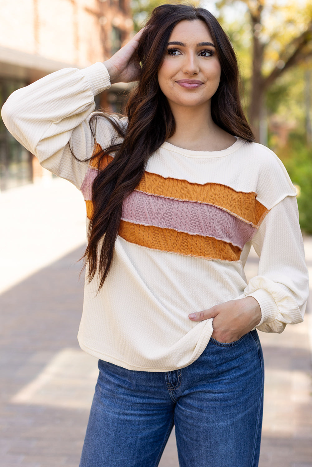 White top with drooping sleeve in patchwork knit *