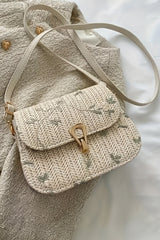 Petit sac d’épaule beige en paille tressée à rabat